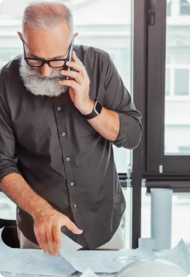 A senior citizen on the phone with a Clover Professional